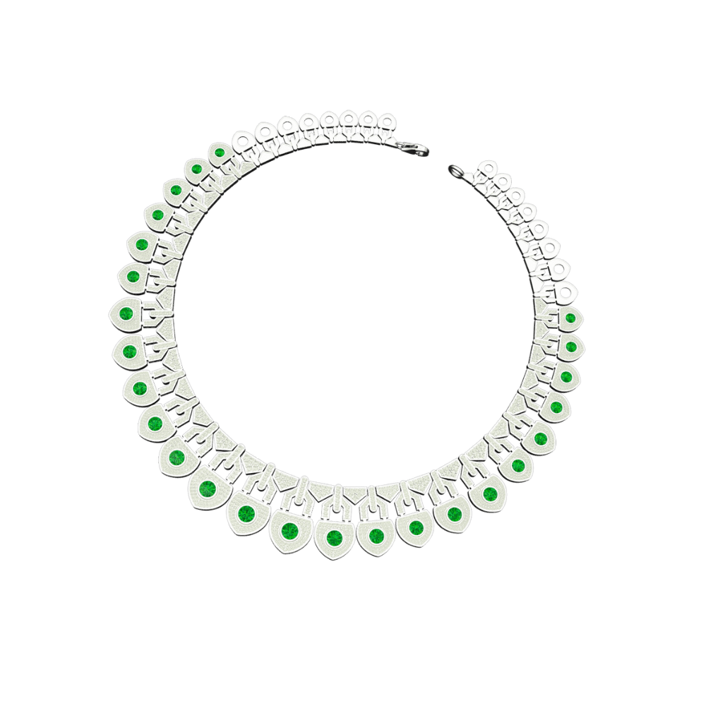 Tribhanga Emerald Shield Necklace in a circular flat-lay display.