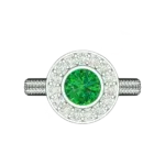 Top view of the Tribhanga emerald bezel ring displaying the concentric design.