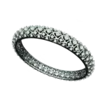 Tribhanga white gold eternity bracelet with intricate side filigree.