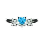 Top view of the Tribhanga blue heart ring displaying the heart shape and symmetry.