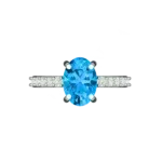 Top view of the Tribhanga blue topaz ring displaying the stone's symmetry.