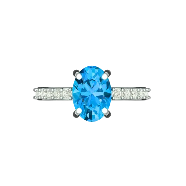 Top view of the Tribhanga blue topaz ring displaying the stone's symmetry.