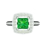 Top view of the Tribhanga square emerald ring displaying the halo and band symmetry.