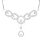 Front view of the Tribhanga white gold diamond necklace showing the filigree and drop design.